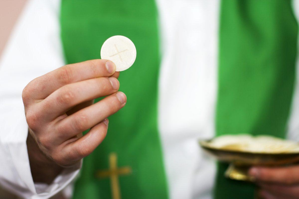 Communion and clergyman.