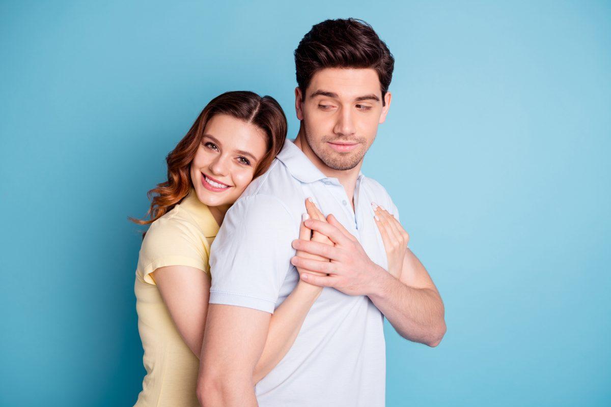 Profile side view portrait of his he her she nice attractive lovely gentle cheerful, peaceful calm people wearing casual cuddling isolated over bright vivid shine blue green background